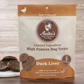 Package of Anita's Pure Nutrition dog treats with visible treats in front, indicating Duck Liver flavor, and text stating Limited Ingredient High Protein Dog Treats.