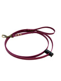 Maroon leather dog leash with brass hardware.