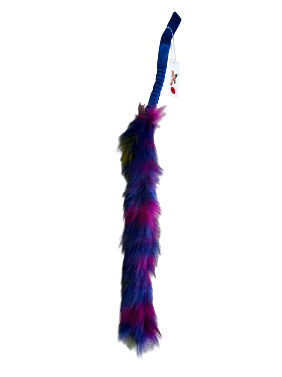 Colorful faux fur dog toy on a white background.