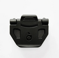 A matte black plastic quick-release buckle or strap component, photographed from a top-down perspective on a clean white background.