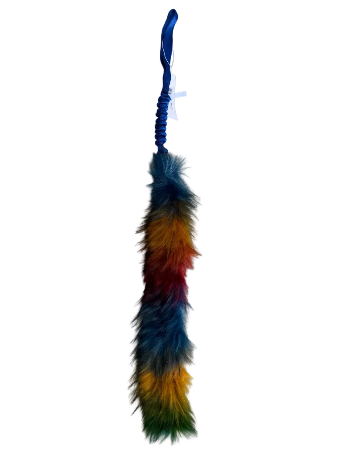 Colorful faux fur dog toy on a white background.