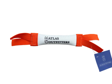 Orange bumper with white label on a white background.