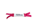 Pink and white bumper with a label on a white background.