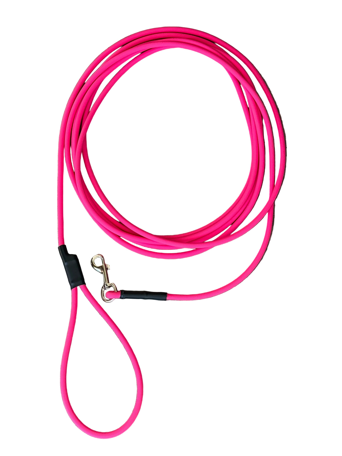A bright pink dog lead rope coiled, featuring a nickel swivel snap hook on a white background.