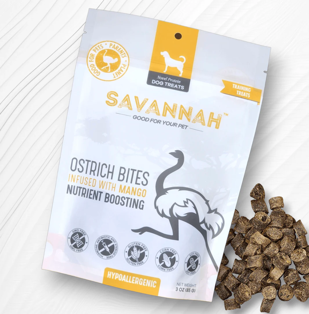 Savannah dog treats package with ostrich bites and mango on a white background