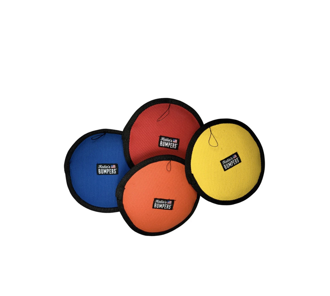 Frequent Flyer Floater floating dog frisbee made from USA fire hose material for fetch on water, grass, and snow.