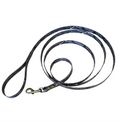 Dog leash coiled on a white background.