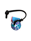 A small round dog ball with a blue, purple, and white pattern, attached to a black rope leash, on a white background.