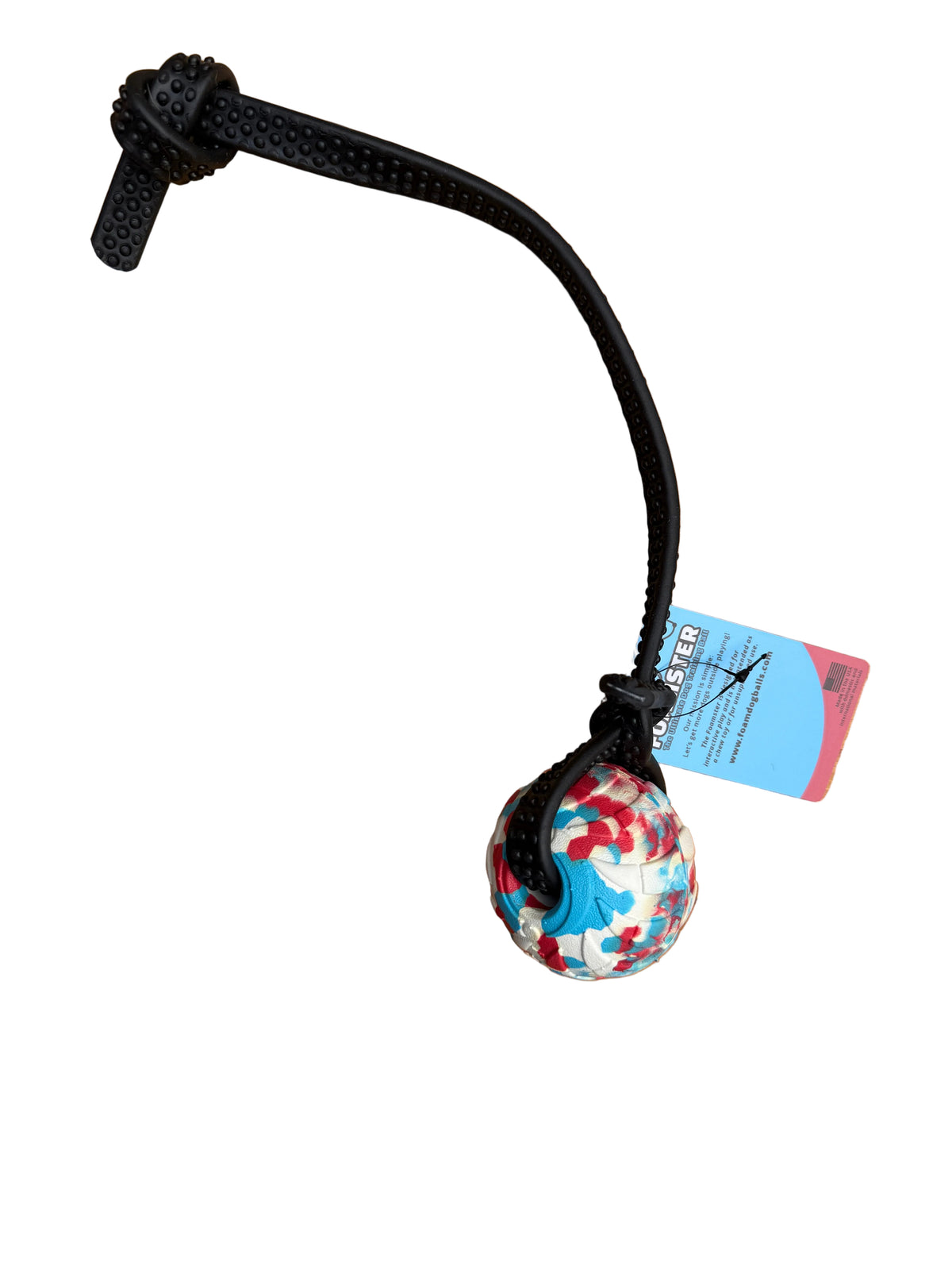 A dog ball with a black rubber strap and a colorful patterned ball, on a white background.