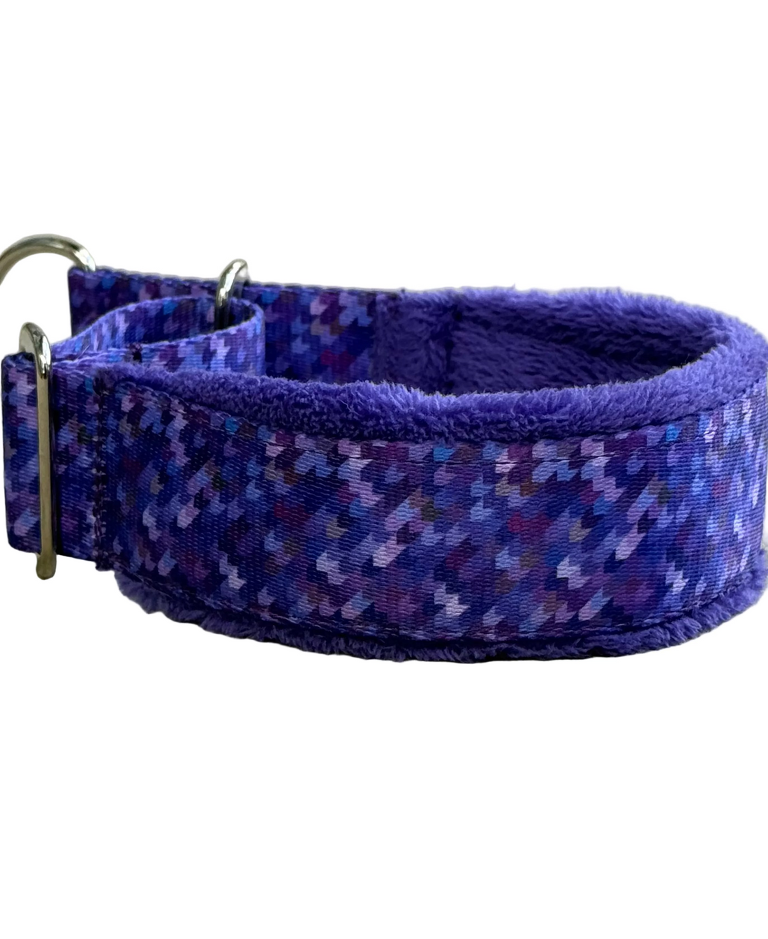 Dog collar with shark pattern and bright green interior on a white background.