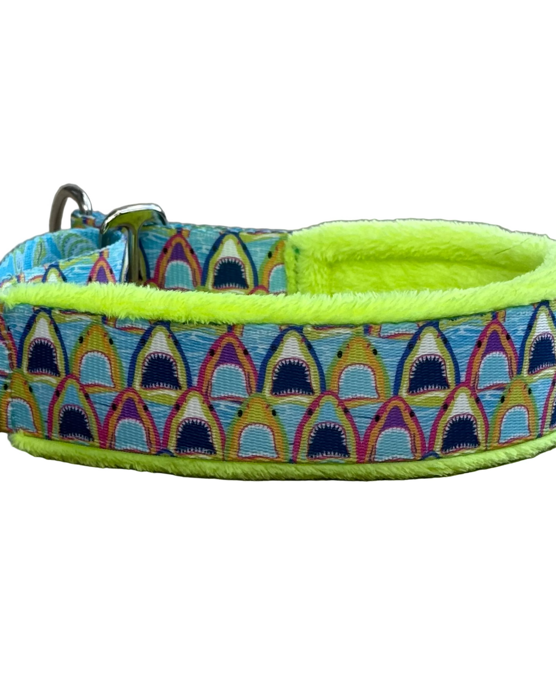 Dog collar with shark pattern and bright green interior on a white background.