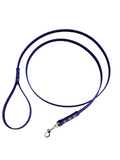 A purple dog leash made of smooth synthetic material, featuring a padded handle and a silver metal snap hook clasp, displayed on a solid white background.